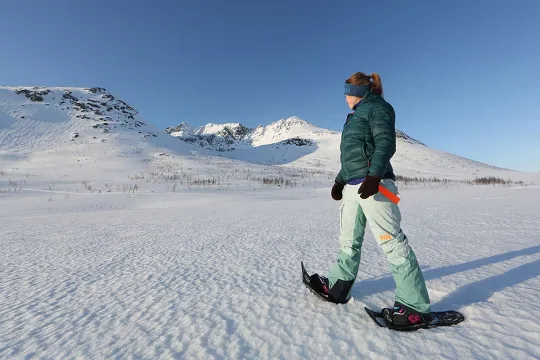 A person with snowshoes on