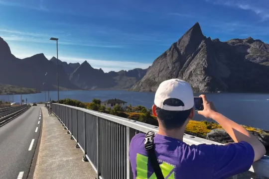 A guest taking pictures of the mountains
